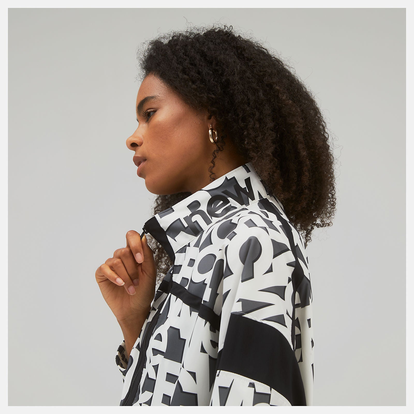 White Relentless Printed Woven Jacket / New Balance Women