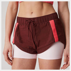 Deep Mauve Bandier Woven tech Short / New Balance Women