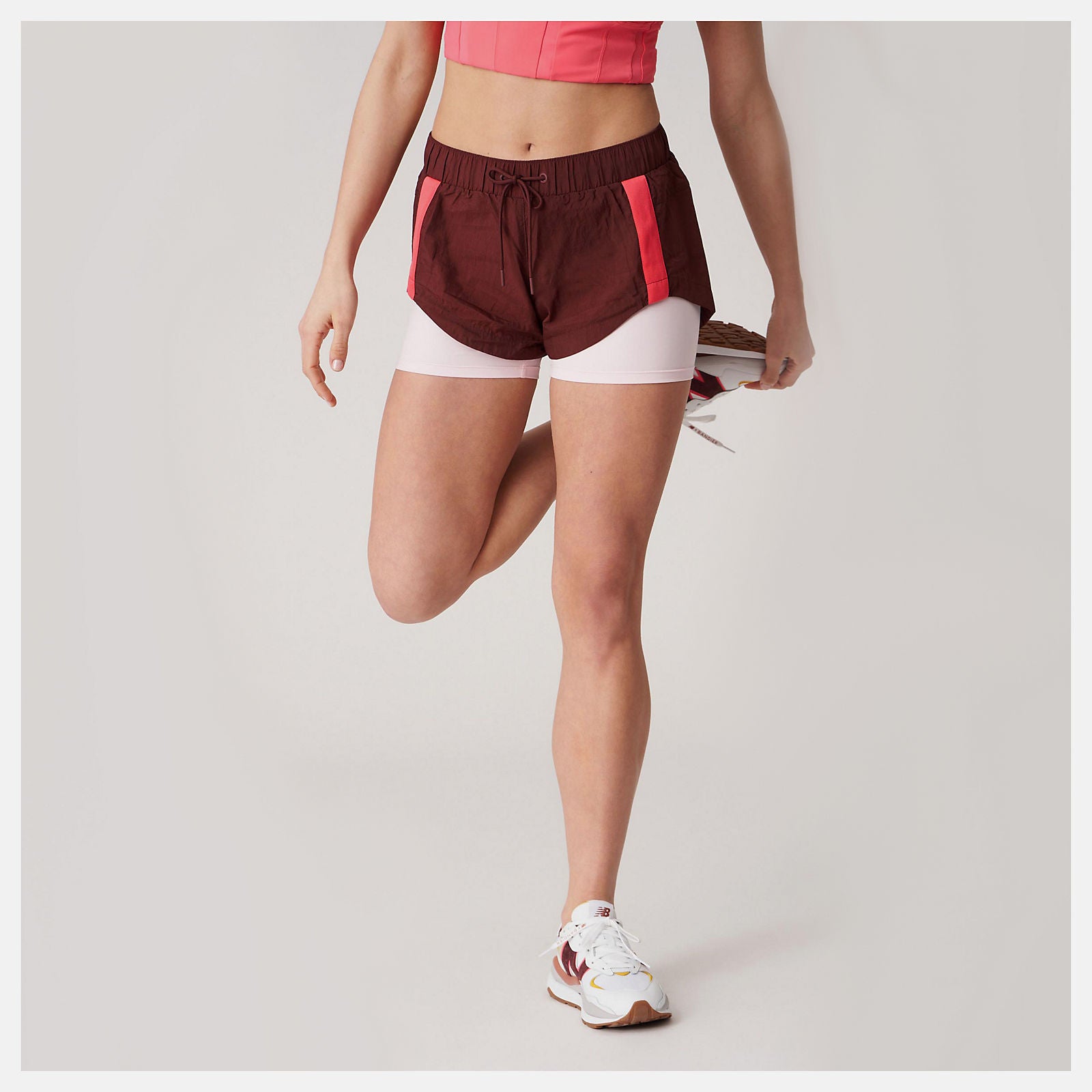 Deep Mauve Bandier Woven tech Short / New Balance Women