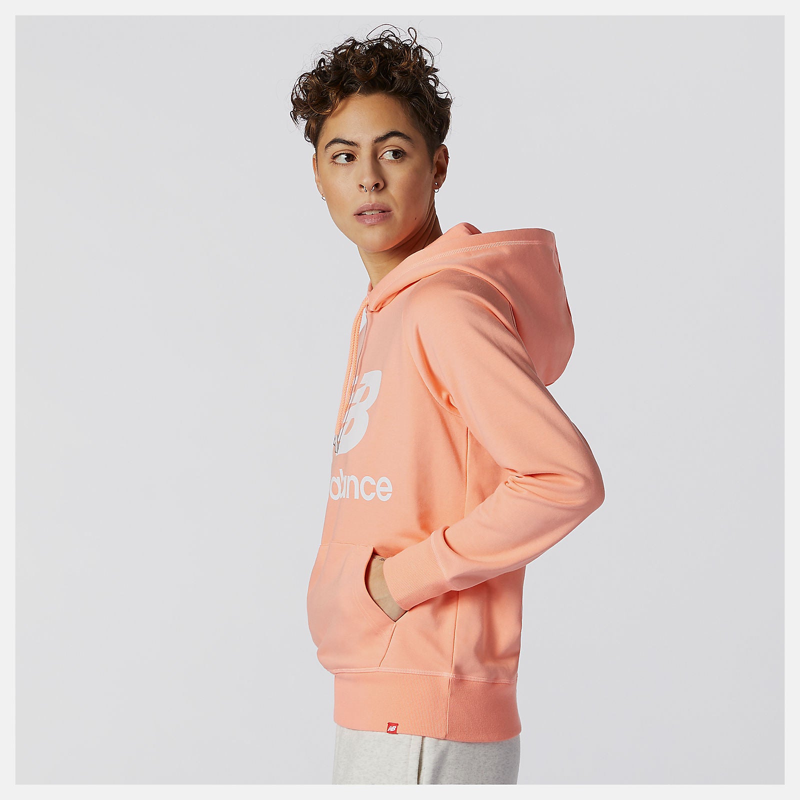 Pink NB Essentials Pullover Hoodie / New Balance Women